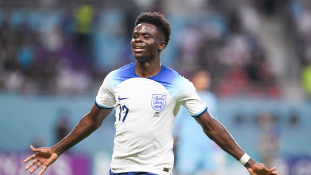 Bukayo Saka pictured celebrating after scoring the first of his two goals during England's win over Iran at the 2022 World Cup in Qatar